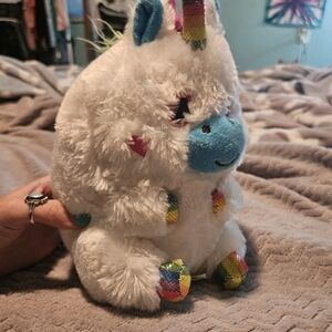 Plush Unicorn Toy with Rainbow Accents